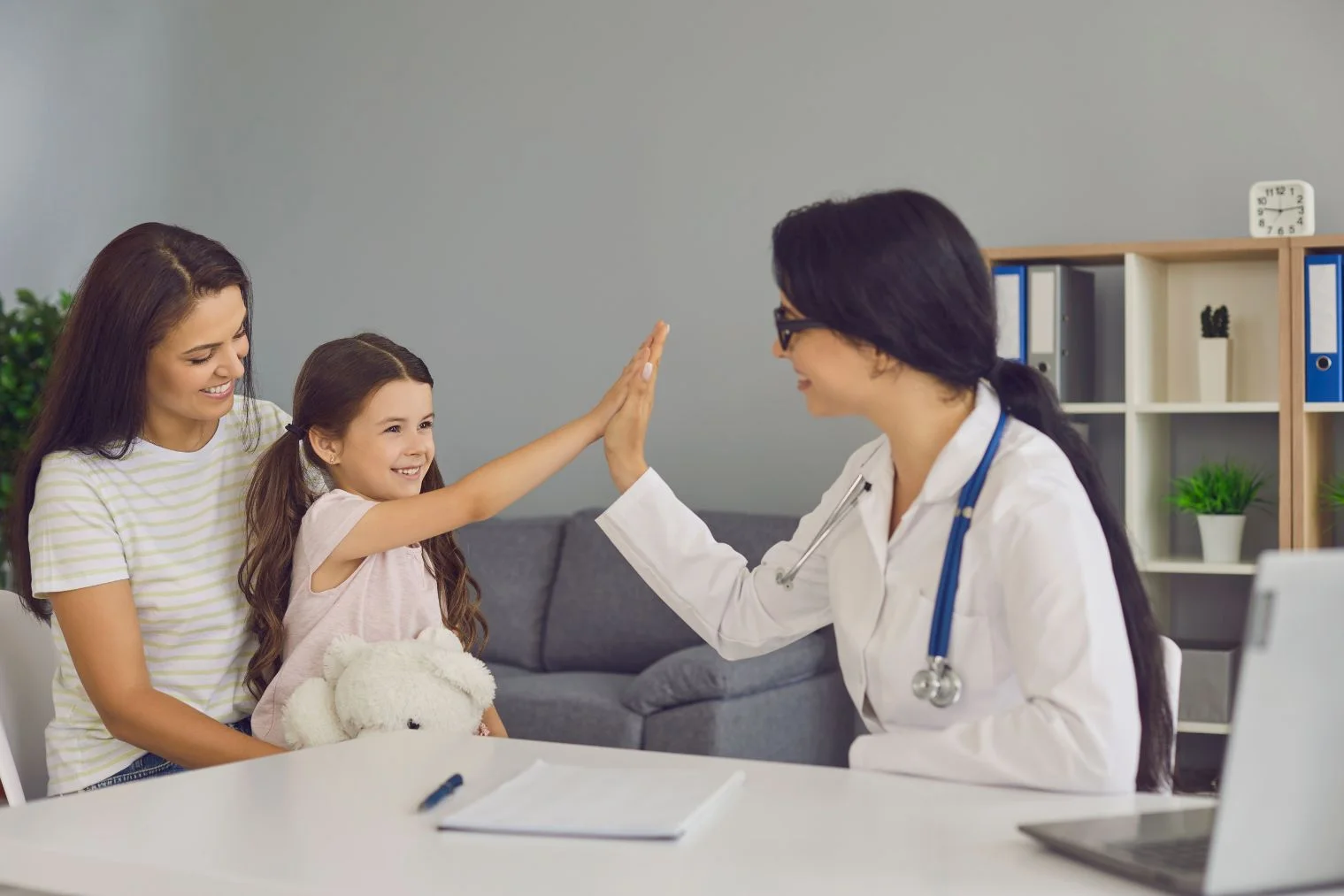 Orange_Medical_Care_Home_Banner_Doctor_And_Kid_Doing_Highfive
